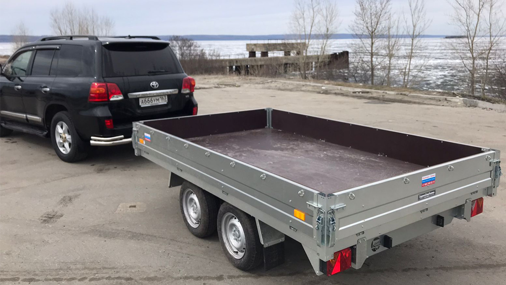 Прицеп бортовой двухосный без тормоза ССТ-7132-24 (платформа Ш=1821 мм) Прицеп бортовой двухосный без тормоза ССТ-7132-24 (платформа Ш=1821 мм)